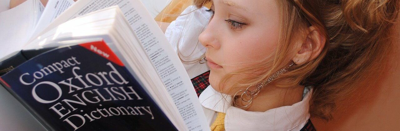 girl studying the dictionary