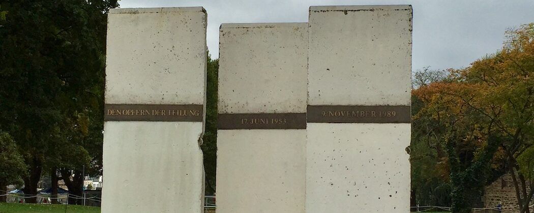 three large cement memorials